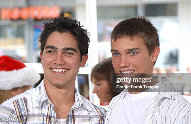 American actor Tyler Hoechlin and his brother Tanner arrive at the benefit premiere of the movie "The Polar Express", directed by Robert Zemeckis.