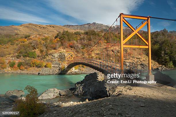bridge across the baker river in puerto bertrand - aysén del general carlos ibáñez del campo stock pictures, royalty-free photos & images