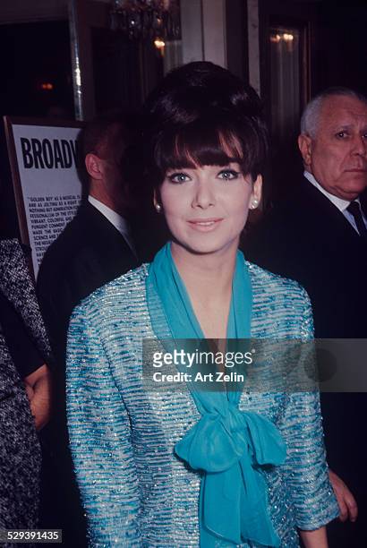Suzanne Pleshette wearing a turquoise chiffon scarf; circa 1970; New York.