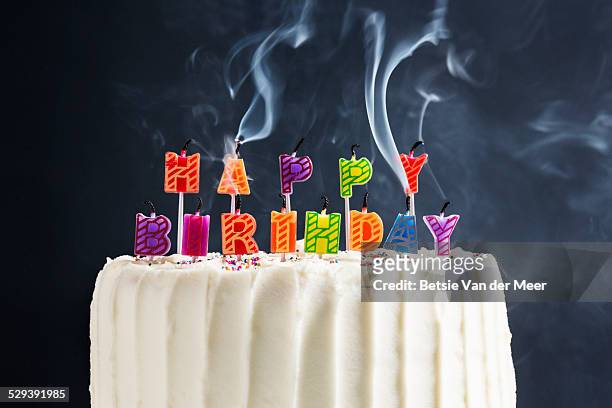 hapstill life of happy birthday candles blown out. - birthday candle on black stock pictures, royalty-free photos & images