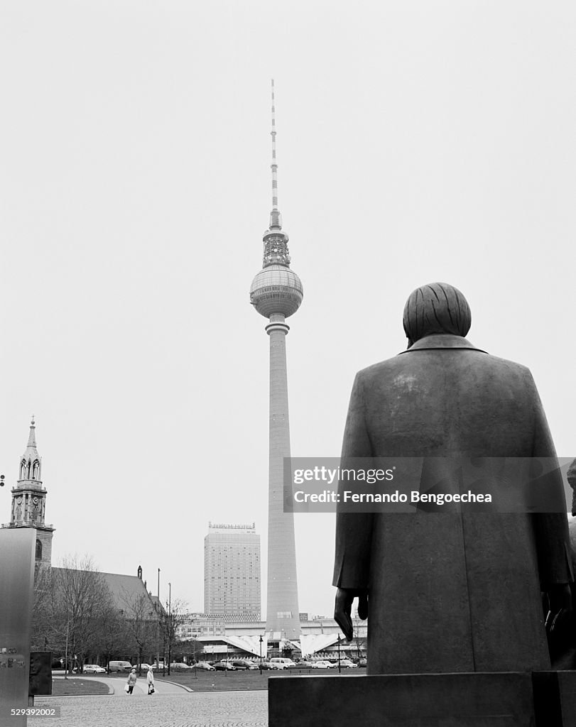 Statue of Friedrich Engels Facing Broadcast Tower