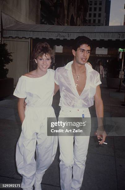 Kristy McNichol wearing white with her boyfriend; circa 1970; New York.