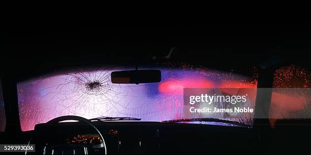 cracked car windshield - broken window stock-fotos und bilder