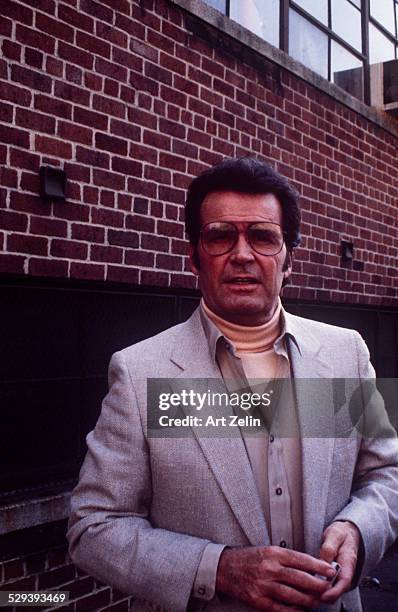 James Garner wearing a jacket and turtle neck sweater; circa 1970; New York.