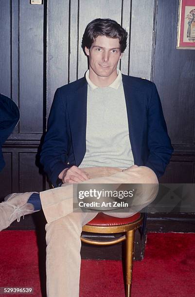 Christopher Reeve in a gray sweater and navy jacket; circa 1970; New York.