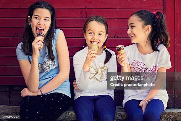 childhood - girls licking girls stock pictures, royalty-free photos & images