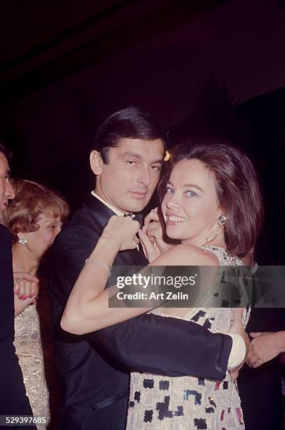 Leslie Caron dancing with Robert Evans; circa 1970; New York.