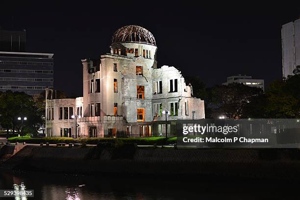 a-bomb (genbaku) dome, at night, hiroshima, japan - hiroshima peace memorial stock pictures, royalty-free photos & images