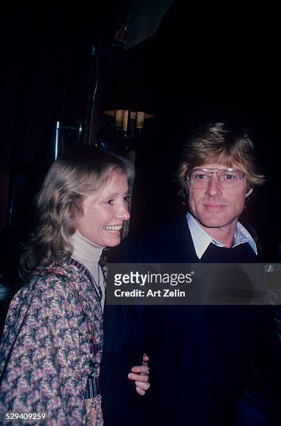 Robert Redford with his wife Lola Van Wagenen dressed casually; circa 1970; New York.