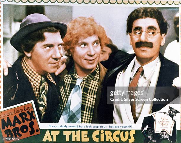 Lobby card for the 1939 Marx Brothers comedy 'At The Circus' , directed by Edward Buzzell and starring Chico, Harpo and Groucho Marx.