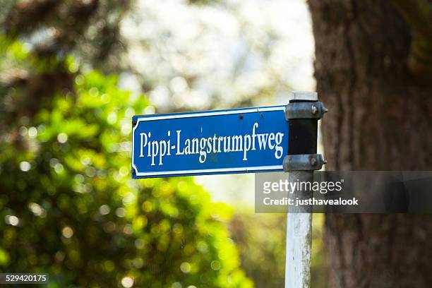 road sign with name pippi langstrumpf - pippi longstocking stockfoto's en -beelden