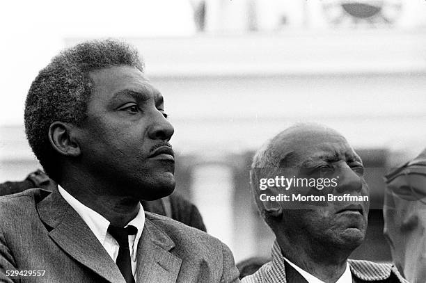 Bayard Rustin and A. Philip Randolph listen to Dr. King deliver his How Long, Not Long speech on the steps of the Alabama State Capitol in...