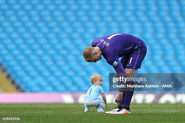 Joe Hart of Manchester City with his son, Harlow Hart after the Barclays Premier League match between Manchester City and Arsenal at the Ethiad...