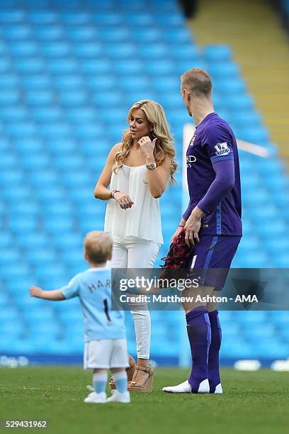 Joe Hart of Manchester City with his son, Harlow Hart and wife, Kimberly Crew after the Barclays Premier League match between Manchester City and...