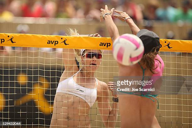 Kerri Walsh Jennings spikes the ball past \Angela Bensend during the women's final match at AVP Huntington Beach Open on May 08, 2016 in Huntington...