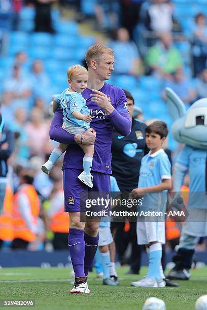 Joe Hart of Manchester City with his son, Harlow Hart after the Barclays Premier League match between Manchester City and Arsenal at the Ethiad...