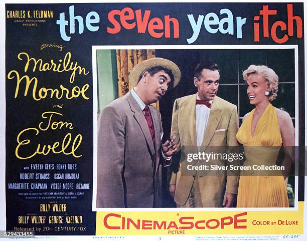 Lobby card for Billy Wilder's 1955 romantic comedy 'The Seven Year Itch', featuring Robert Strauss, Tom Ewell and Marilyn Monroe.