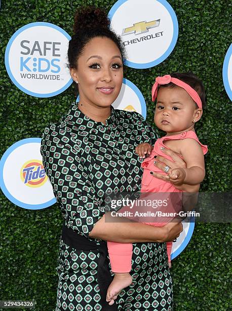 Actress Tamera Mowry and daughter Ariah Talea Housley attend Safe Kids Day at Smashbox Studios on April 24, 2016 in Culver City, California.