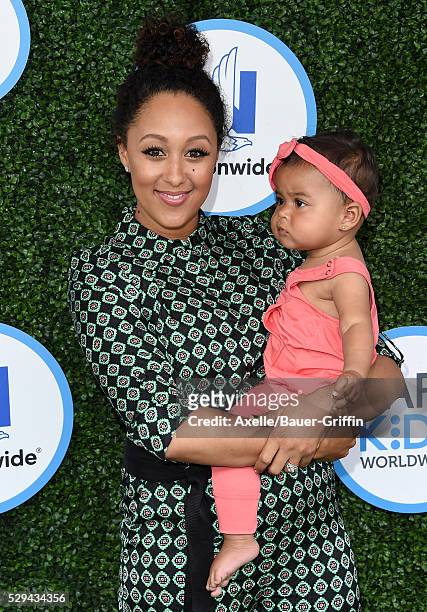 Actress Tamera Mowry and daughter Ariah Talea Housley attend Safe Kids Day at Smashbox Studios on April 24, 2016 in Culver City, California.