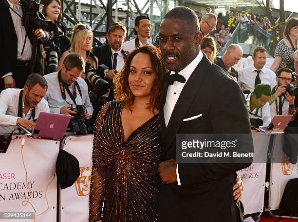 Naiyana Garth and Idris Elba attend the House Of Fraser British Academy Television Awards 2016 at the Royal Festival Hall on May 8, 2016 in London,...