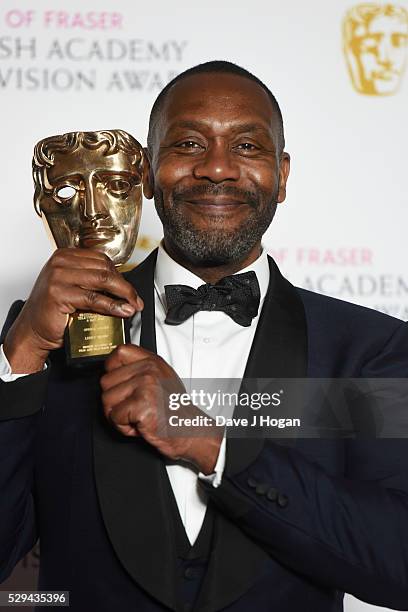 Sir Lenny Henry poses for a photo in the winners room during the House Of Fraser British Academy Television Awards 2016 at the Royal Festival Hall on...