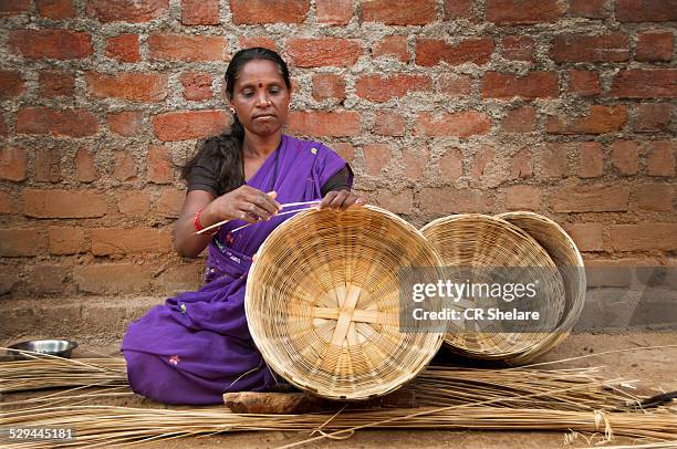 tribe women making basket - basket weaving stock pictures, royalty-free photos & images