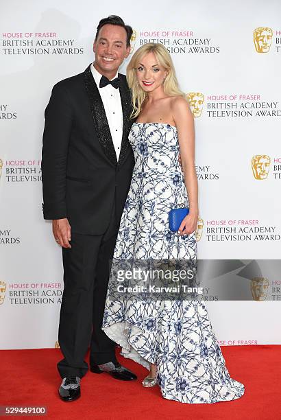 Presenters Craig Revel Horwood and Helen George pose in the winners room at the House Of Fraser British Academy Television Awards 2016 at the Royal...