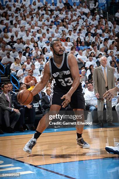 Boris Diaw of the San Antonio Spurs handles the ball against the Oklahoma City Thunder in Game Four of the Western Conference Semifinals during the...