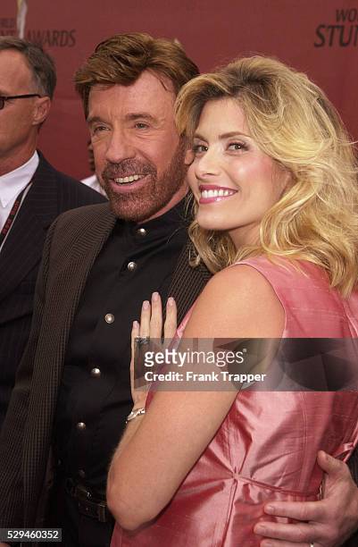 Chuck Norris with his wife Gena O'Kelley, who is expecting twins, at the World Stunt Awards 2001, honoring the men and women who risk their lives to...