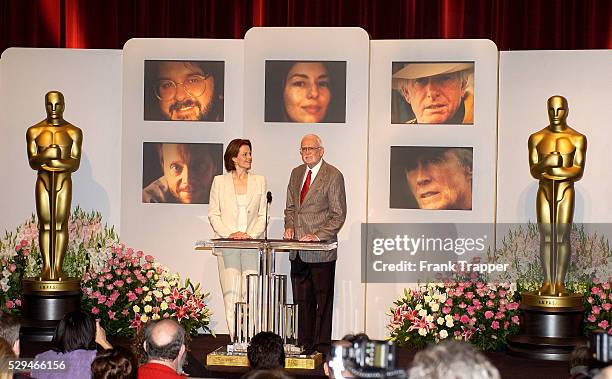 Actress Sigourney Weaver and President of the Academy of Motion Picture Arts and Sciences Frank Pierson announce the nominees for Best Director for...