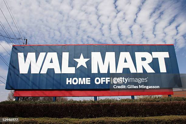 Sign announces the headquarters of the wordl's biggest corporation, Wal-Mart, on Walton Blvd., named after Wal-Mart founder Sam Walton, March 16,...