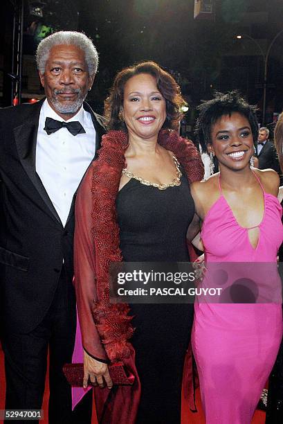 Actor Morgan Freeman, his wife Myrna Colley-Lee and daughter Deena pose as they arrive for the screening of US directors Frank Miller and Robert...