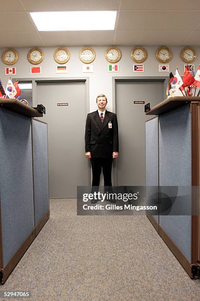John Menzer, CEO of Wal-Mart International, poses in front of his modest office at the Wal-Mart headquarters on March 17, 2005 in Bentonville,...