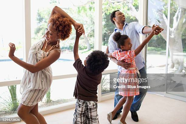 family dancing together - vintage mother and child stock pictures, royalty-free photos & images