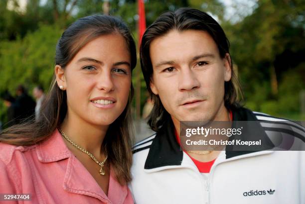 Guillermo Coria of Argentina and his girlfriend Carla arrive at the Champions Night at the K21 museum during the Tennis ARAG World Team Cup on May...