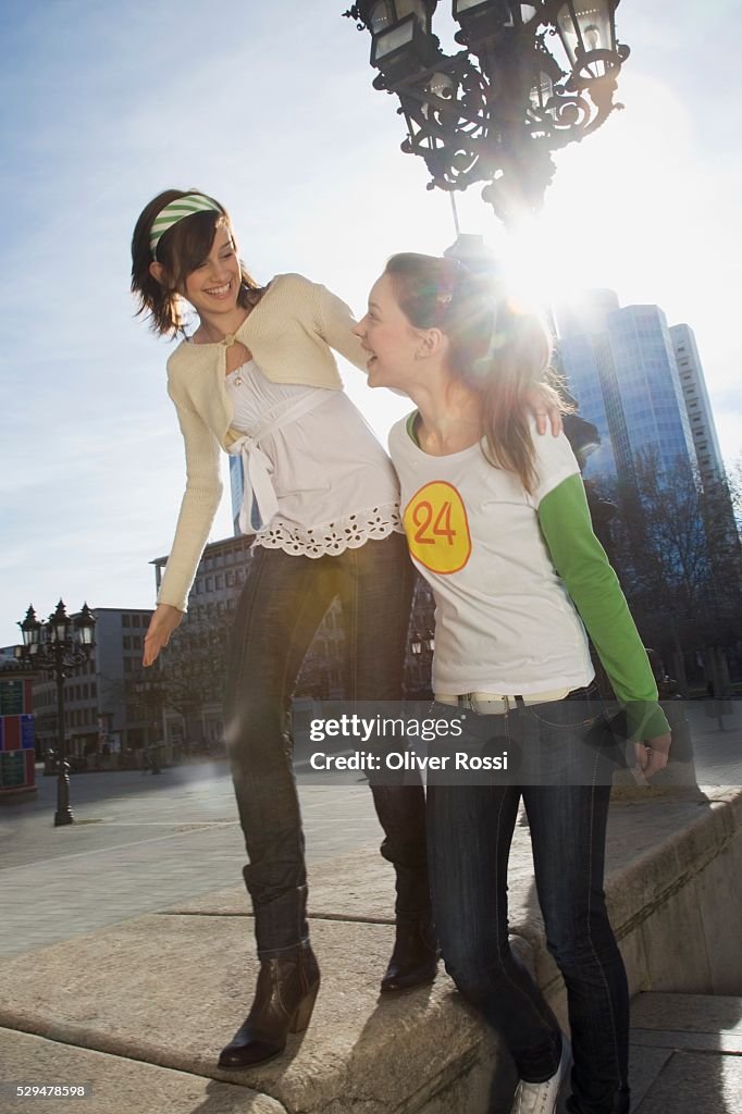 Young women walking together