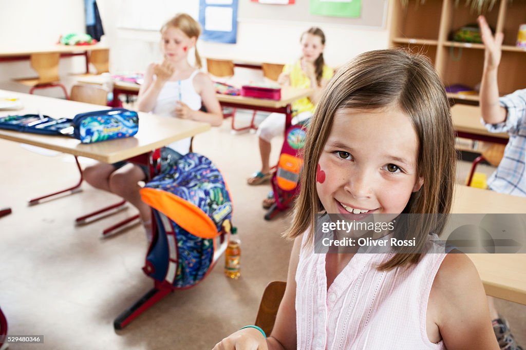 Girl smiling in classroom