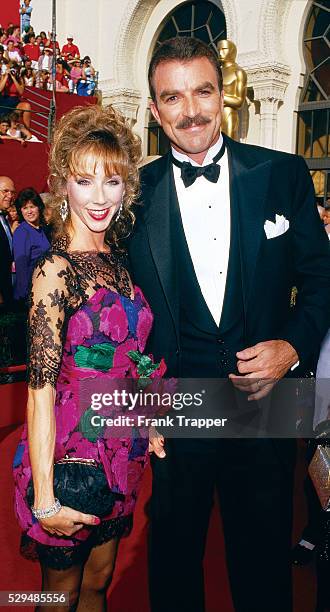 Actor Tom Selleck and wife Jilly Mack arrive at the 1988 Academy Awards. This photo appears on page 49 in Frank Trapper's RED CARPET book.