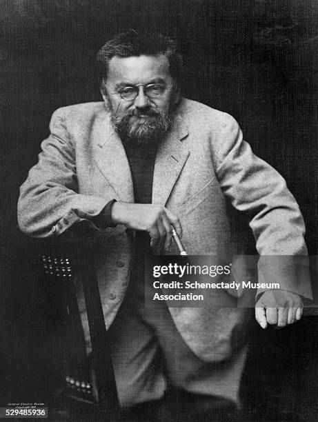 Charles Proteus Steinmetz, head of the General Electric Company's engineering department, in 1915. Steinmetz' experiments with alternating current...