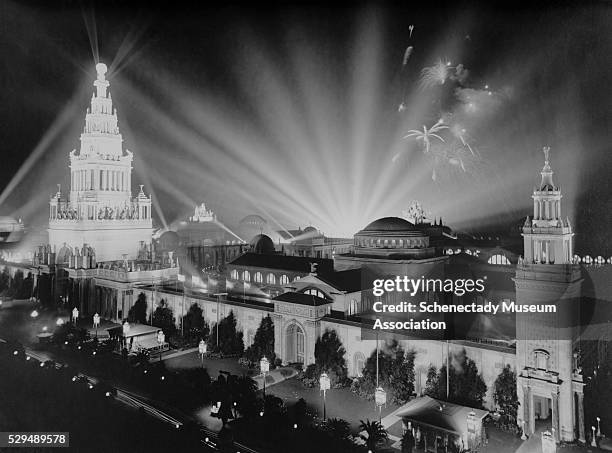 Bright beams of light illuminate the grounds and buildings of the Panama-Pacific International Exposition in San Francisco in 1915. The lighting was...
