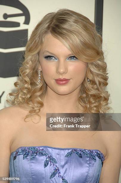 Singer Taylor Swift arrives on the red carpet during the 50th Annual GRAMMY�� Awards at the Staples Center, in Los Angeles. Dress by Sandy Spika,...