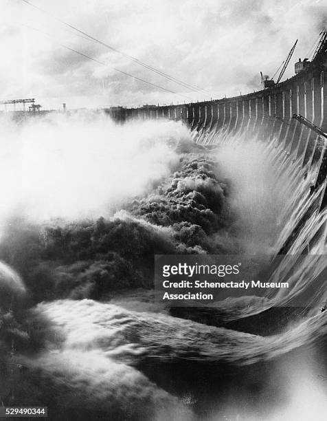 Water surges down the spillway of the Dniprohes Hydroeletric Station, then known as the Dneprostroy Dam, on the Dniper in the USSR.