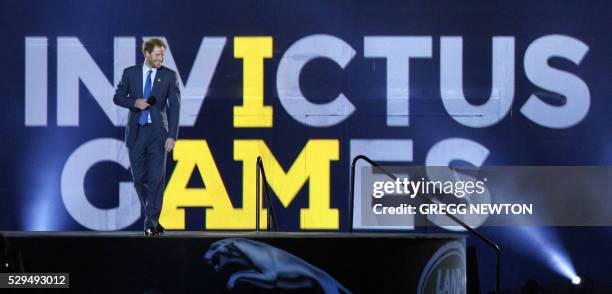 Britain's Prince Harry, Patron of the Invictus Games Foundation, delivers remarks during opening ceremonies for the 2016 Invictus Games in Orlando,...