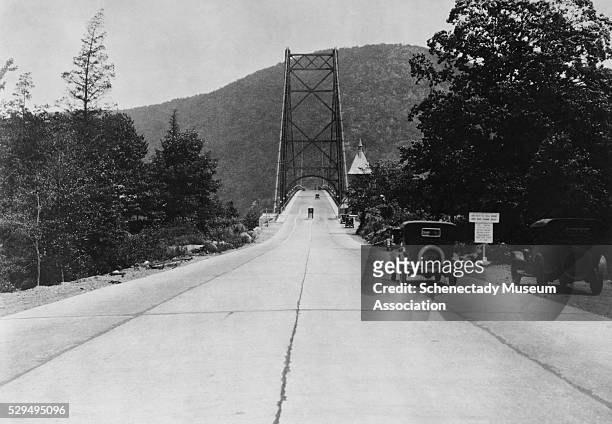 Vehicle approaches the Bear Mountain Bridge from the west end of the bridge. All vehicles must stop at the toll house before traveling over the...