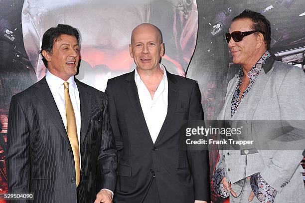 Actors Sylvester Stallone, Bruce Willis and Mickey Rourke arrive at the Premiere of Lionsgate Films' "The Expendables" held at Grauman's Chinese...