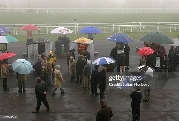 The scene in the betting ring at Goodwood Racecourse on May 19, 2005 in Goodwood, England. After a long delay racing for the day was abandonded due...