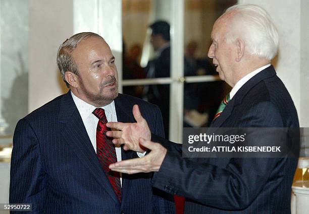 Albanian Prime Minister Fatos Nano listens to Hungarian President Ferenc Madl in the Mirror Hall of the Hungarian presidental residence at Sandor...