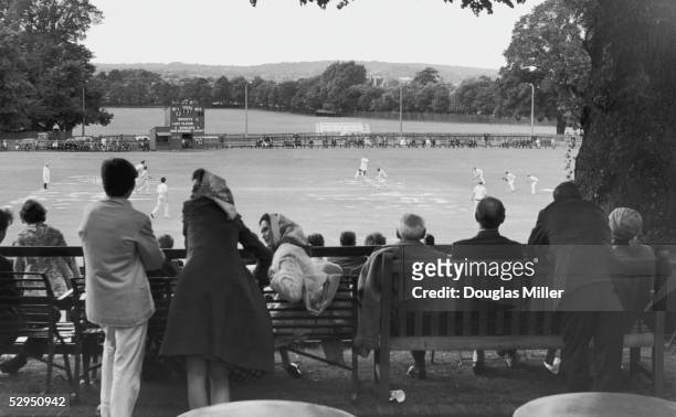 Spectators watching the annual cricket match between the Eton and Harrow public schools played on the sixth-form ground at Harrow school, 9th July...