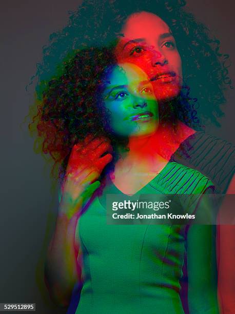 multiple exposure,portrait of a female, looking up - multiple images of the same woman stock pictures, royalty-free photos & images