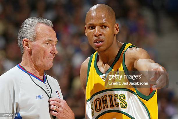 Ray Allen of the Seattle SuperSonics talks to referee Jack Nies during the game against the Sacramento Kings in Game four of the Western Conference...